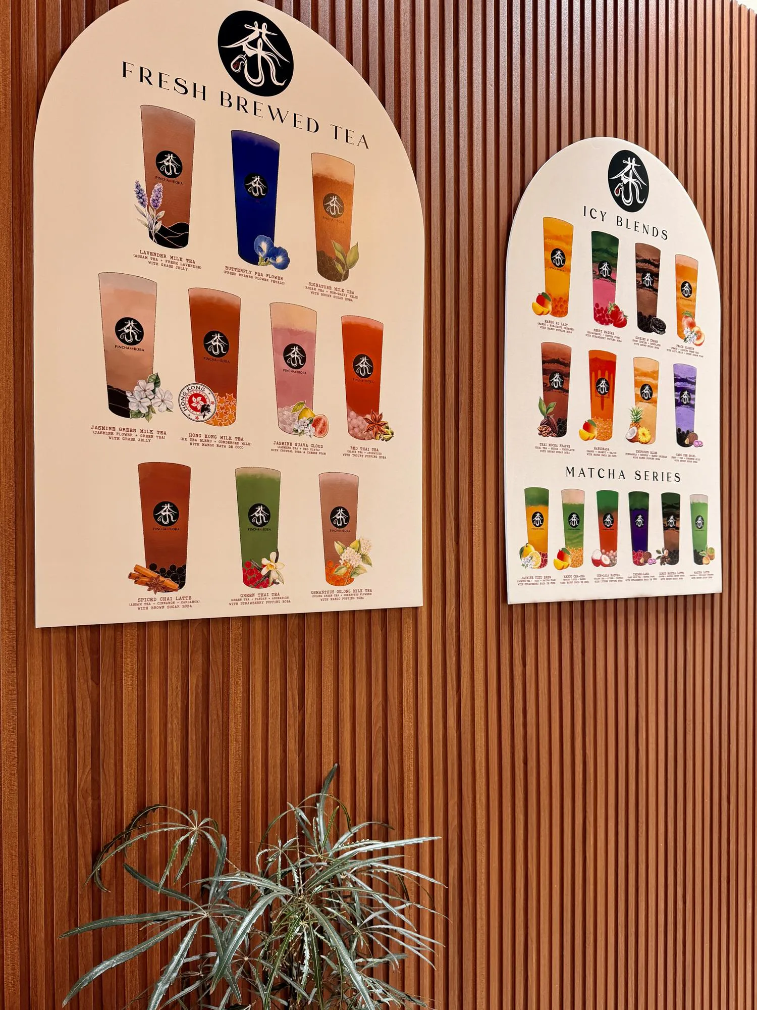 Fresh Brewed Tea and Icy Blends Menu Display on a Modern Wood Accent Wall
